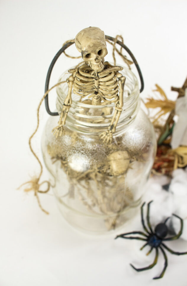 Skeleton jars are the perfect addition to your decor this fall! Here are 20 spellbinding fall mason jar crafts DIY ideas!
