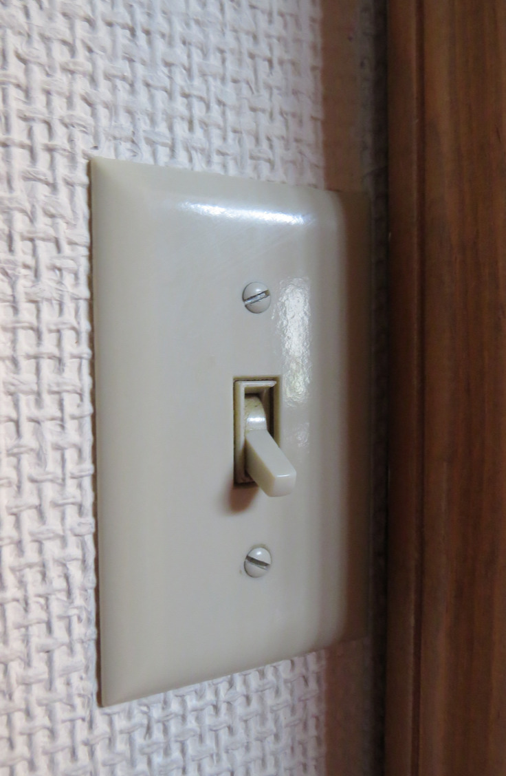 Home upgrades on a budget are possible! You can upgrade your light switch by adding a frame around it.