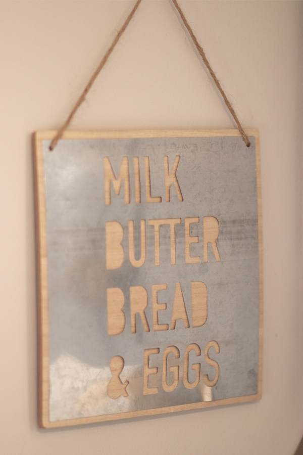 If you love Joanna Gaines and saving money, you will love these Joanna Gaines inspired farmhouse dollar store DIYs. Make farmhouse signs with foam-board and galvanized metal.