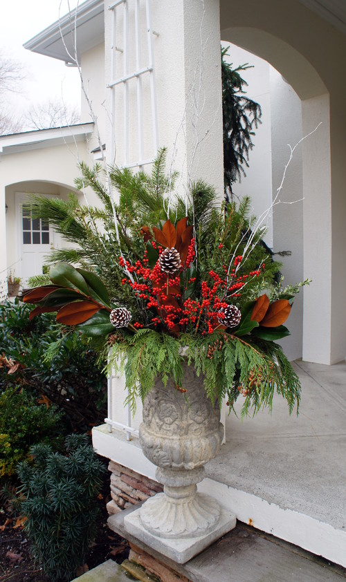 As you decorate your home this season, don't forget to include winter porch outdoor Christmas planters. Lights are amazing, but any of these outdoor Christmas planters will put the finishing touch on your winter porch decor. Don't miss them!