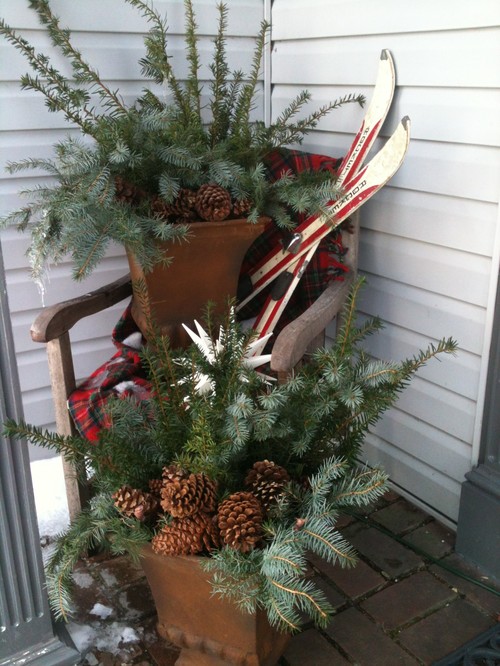 As you decorate your home this season, don't forget to include winter porch outdoor Christmas planters. Lights are amazing, but any of these outdoor Christmas planters will put the finishing touch on your winter porch decor. Don't miss them!