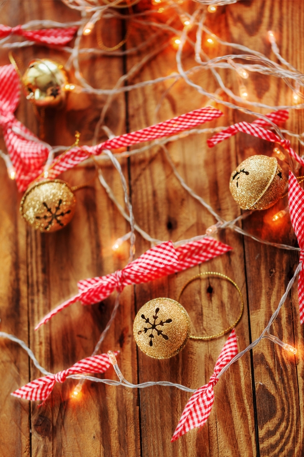 Everyone should add some jingle bells to their holiday decor. If you're looking for your next DIY project, look no further. Here are some jingle bell garland ideas you'll love!