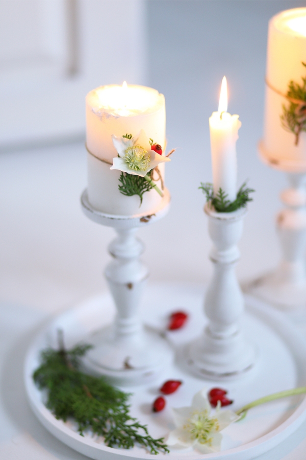 Candlesticks are a staple for farmhouse decor, so converting them into Christmas candlesticks is pretty easy. For the best farmhouse Christmas decor, look here.